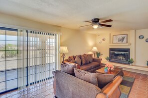 Smart TV, fireplace, books