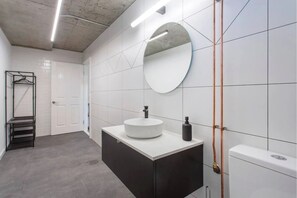 Shower, hair dryer, towels, toilet paper