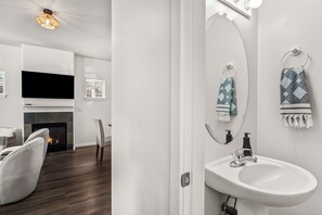 Hair dryer, towels, soap, toilet paper