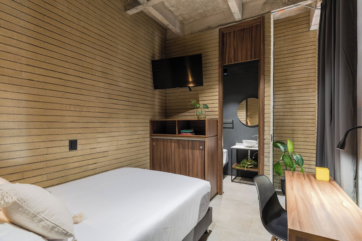 1 bedroom, desk, laptop workspace, iron/ironing board