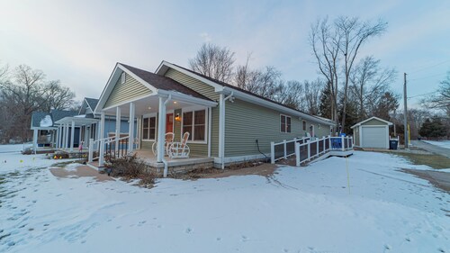 Charming 3-bedroom house in Michigan City is handicapp friendly with a ramp.