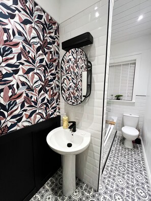 Hair dryer, towels, soap, shampoo