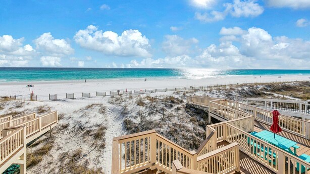A beach view with a wooden deck and a beach house. - Free Beach Service~ Beachfront Townhome ~ Sleeps 8-GreenReef #4 (Destin)