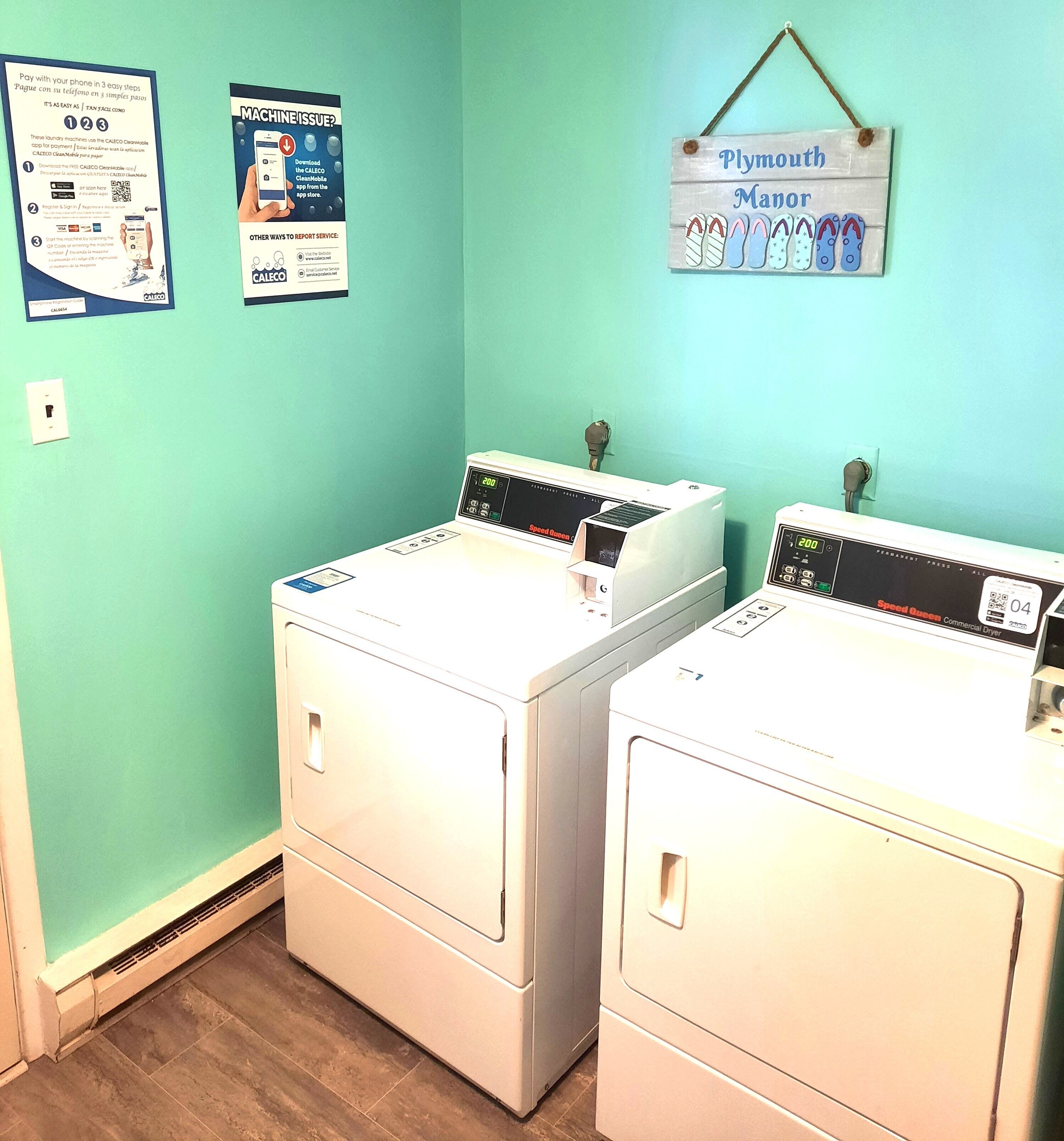Mobile-pay laundry room with 2 washers and 2 dryers.