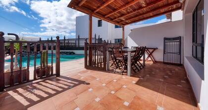 Casa Hibiscus - Shared Pool and BBQ - Close to Seafront Promenade By Lanzarote Vacation Homes