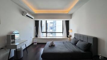 Apartment, City View | Laptop workspace, blackout curtains, iron/ironing board, free WiFi