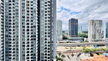 Apartment, Balcony, City View | Laptop workspace, blackout drapes, iron/ironing board, free WiFi