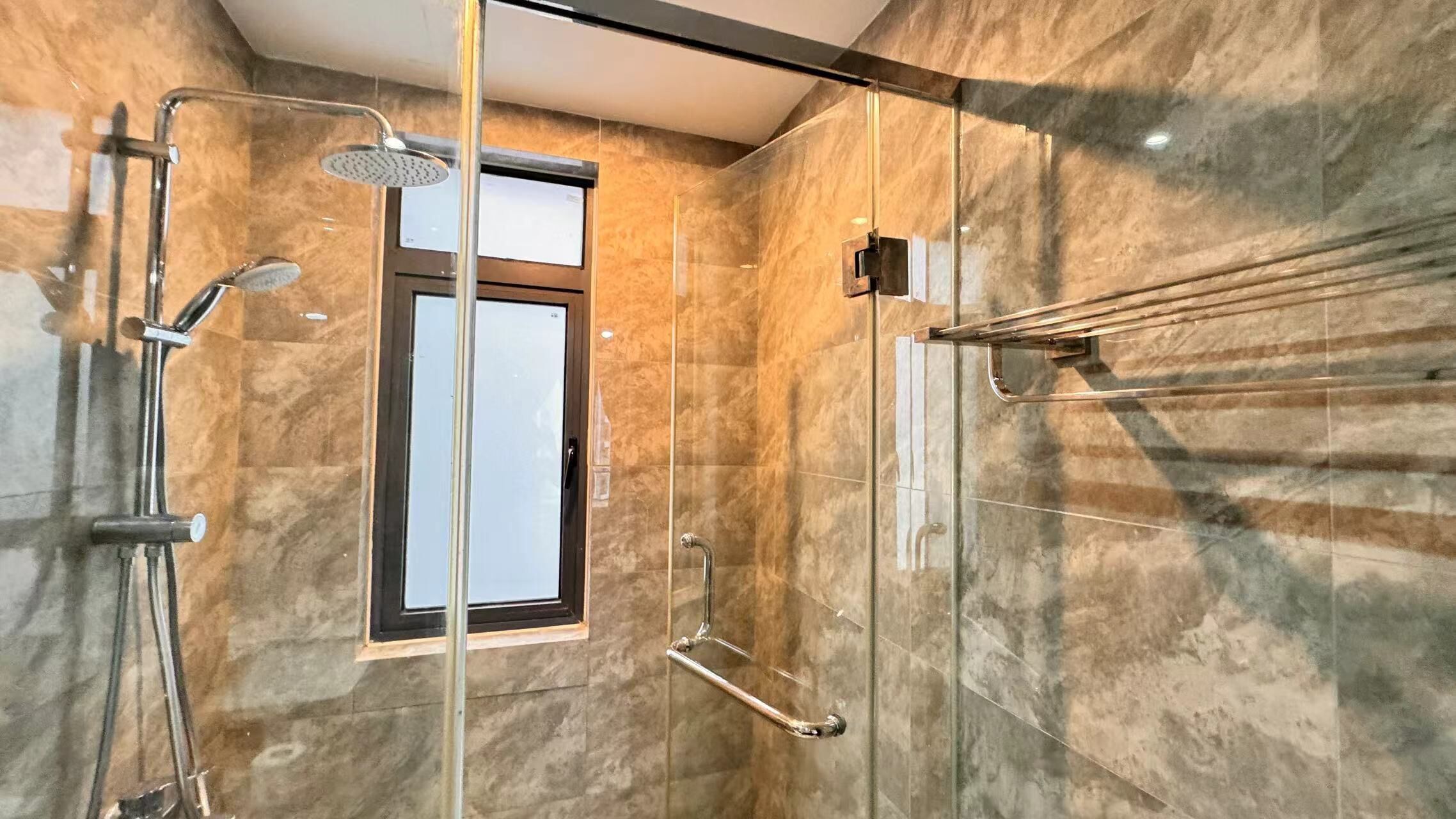 A modern bathroom with a glass shower enclosure, a handheld showerhead, a handheld showerhead, a handheld showerhead, a handheld showerhead, a handheld showerhead, a handheld showerhead, a handheld showerhead, a handheld showerhead, a handheld showerhead, a handheld showerhead, a handheld showerhead, a handheld showerhead, a handheld showerhead, a handheld showerhead, a handheld showerhead, a handheld showerhead, a handheld showerhead, a handheld showerhead, a handheld showerhead, a handheld showerhead, a handheld showerhead, a handheld showerhead, a handheld showerhead, a handheld showerhead, a handheld showerhead, a handheld showerhead, a handheld showerhead, a handheld showerhead, a handheld showerhead, a handheld showerhead, a handheld showerhead, a handheld showerhead, a handheld showerhead, a handheld showerhead, a handheld showerhead, a handheld showerhead, a handheld showerhead, a handheld shower