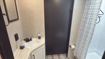 Shower, towels, soap, shampoo