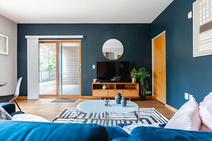 Apartment, 1 Queen Bed, Patio | Living area | Smart TV