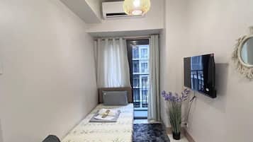 Comfort Room, 1 Bedroom, Pool View | Living area | 40-inch Smart TV with digital channels