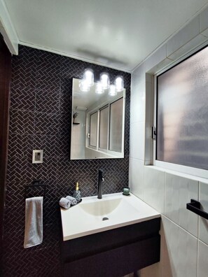 Hair dryer, towels, soap, toilet paper