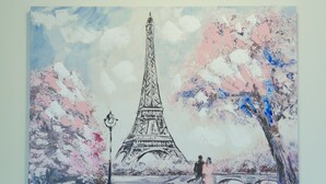 A painting of the Eiffel Tower with cherry blossoms and two people in the foreground. - Stargazing Tekapo Apartment C (Lake Tekapo)