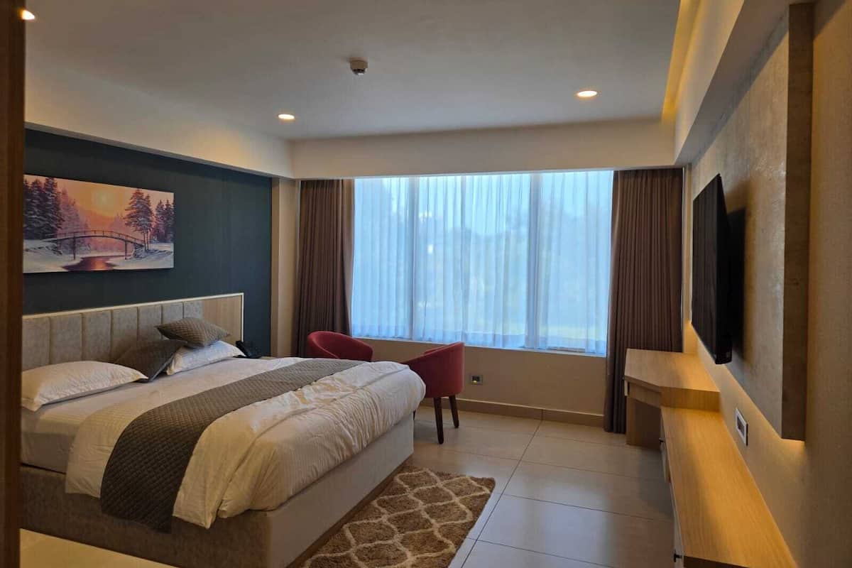 Premium bedding, down duvets, memory-foam beds, minibar