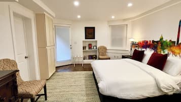 1 bedroom, desk, iron/ironing board, travel crib