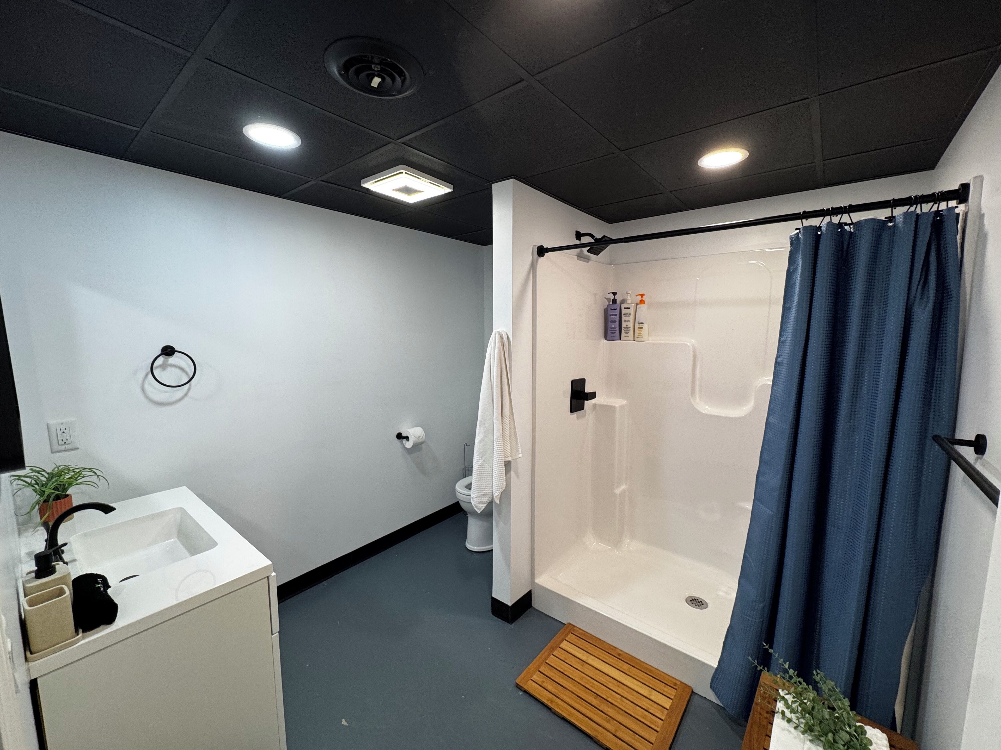 Shower, eco-friendly toiletries, hair dryer, towels