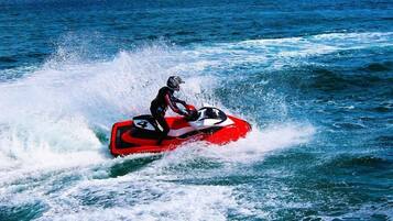 A person riding a jet ski on the water.