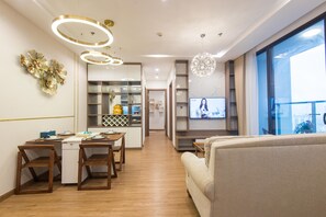 Apartment, 2 Bedrooms, City View | Living area | 55-inch flat-screen TV with cable channels, Netflix, streaming services - Vinhomes Metropolis Residence (Hanoi)
