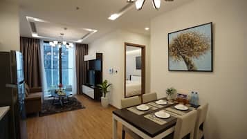 Apartment, 1 Bedroom, City View | Living area | 55-inch flat-screen TV with cable channels, Netflix, streaming services