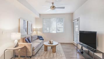 Apartment, 1 Bedroom | Living area | 40-inch TV with digital channels