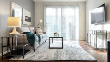 Apartment, 2 Bedrooms | Living area | 40-inch TV with digital channels