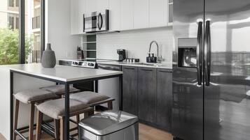 Apartment, 2 Bedrooms | Private kitchen | Full-size fridge, microwave, oven, stovetop