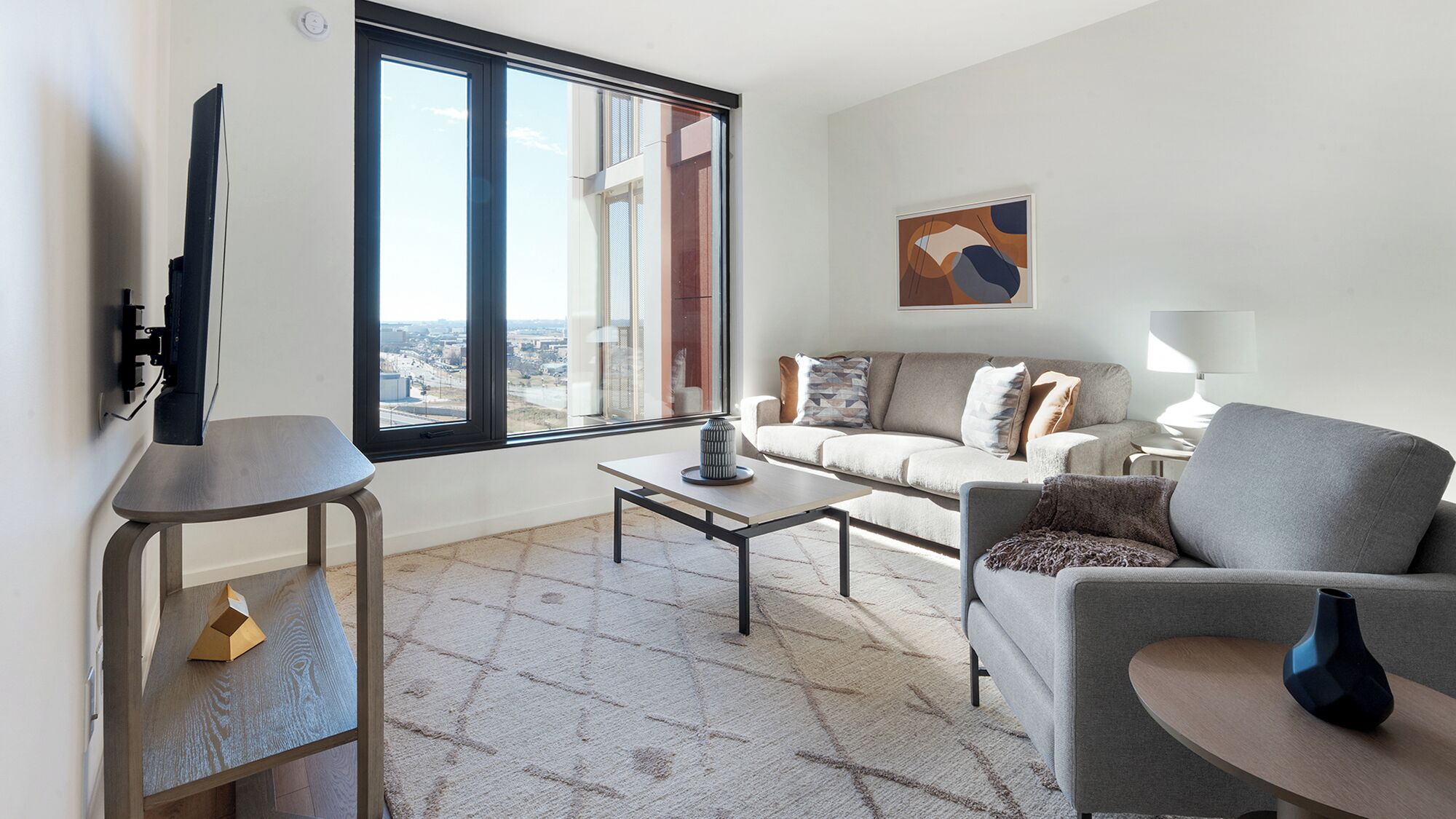 Standaard appartement (1 Bedroom) | Woonruimte | Een 40-inch televisie met digitale zenders