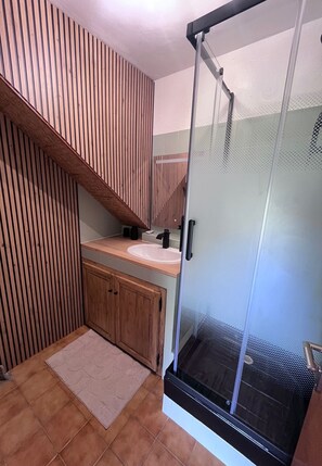 Shower, hair dryer, towels, soap