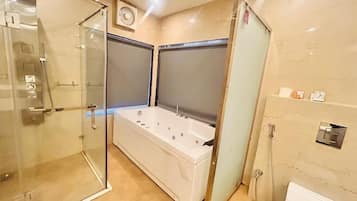 Family Studio Suite, City View | Bathroom | Hair dryer, bathrobes, slippers, towels