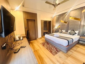 Family Studio Suite, City View | Iron/ironing board, free WiFi - Hotel Holiday international (Purnia)