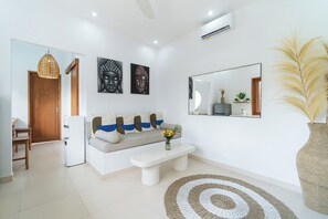 Exclusive Villa, Courtyard View | Living area | Flat-screen TV