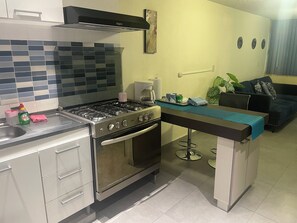 Microwave, oven, coffee/tea maker, cookware/dishes/utensils