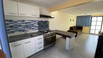 Microwave, oven, coffee/tea maker, cookware/dishes/utensils