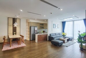 Apartment, 4 Bedrooms, City View | Living area | 55-inch flat-screen TV with cable channels, Netflix, streaming services