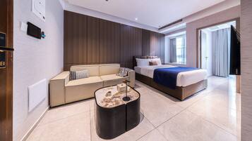 Family Condo | Desk, laptop workspace, iron/ironing board, free WiFi