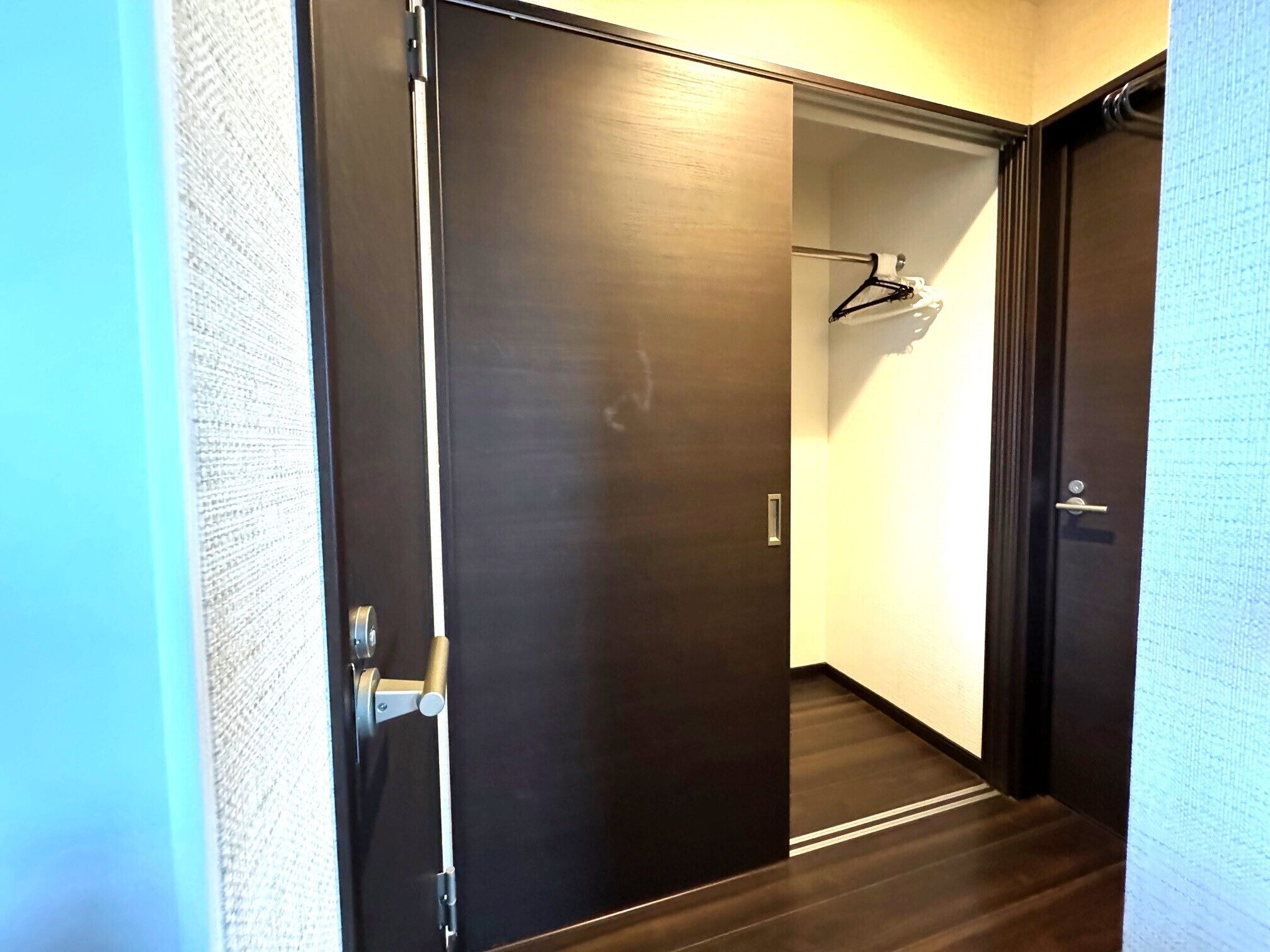 Hypo-allergenic bedding, desk, laptop workspace, blackout drapes