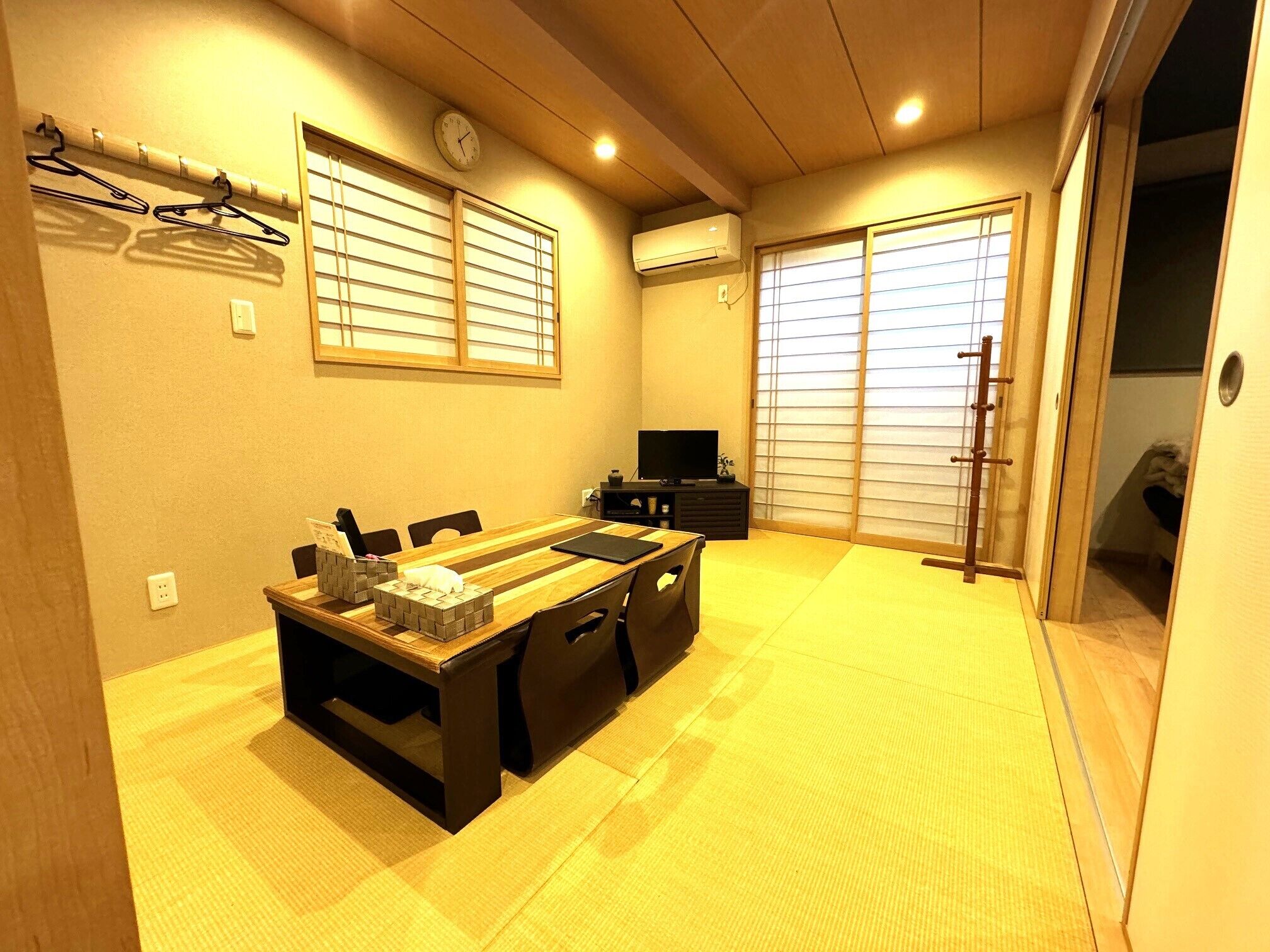 Hypo-allergenic bedding, desk, laptop workspace, blackout curtains