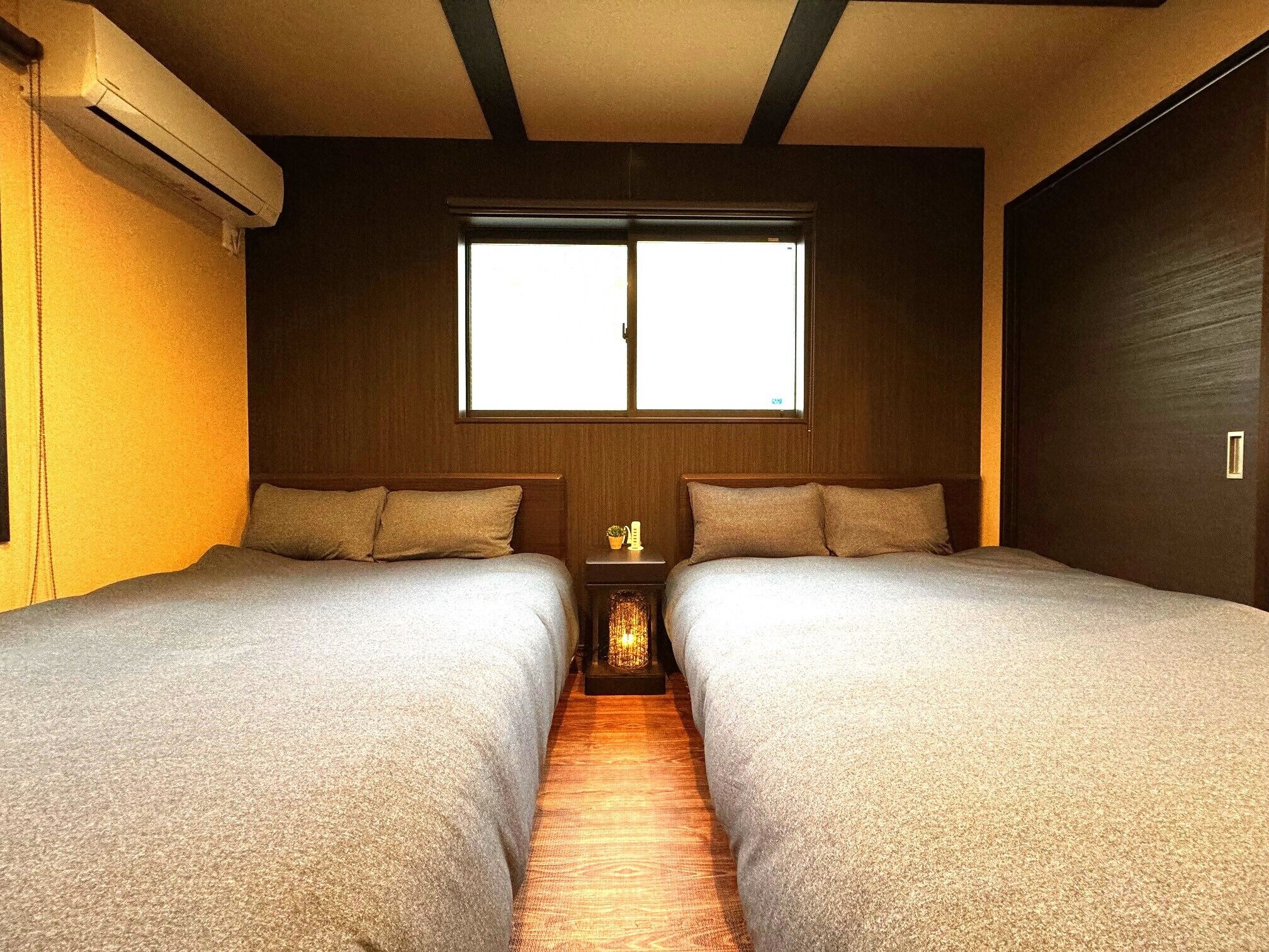 Hypo-allergenic bedding, desk, laptop workspace, blackout curtains