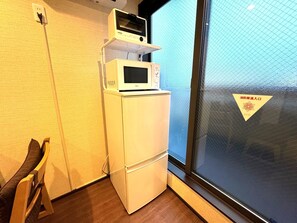 Hypo-allergenic bedding, desk, laptop workspace, blackout curtains