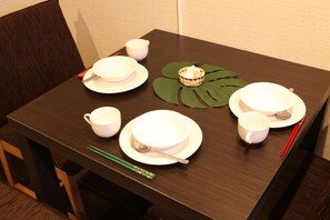 Hypo-allergenic bedding, desk, laptop workspace, blackout curtains