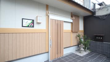 Hypo-allergenic bedding, desk, laptop workspace, blackout curtains