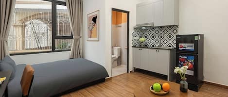 Executive Studio, City View | Individually furnished, desk, laptop workspace, free WiFi