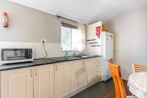 Fridge, microwave, stovetop, electric kettle