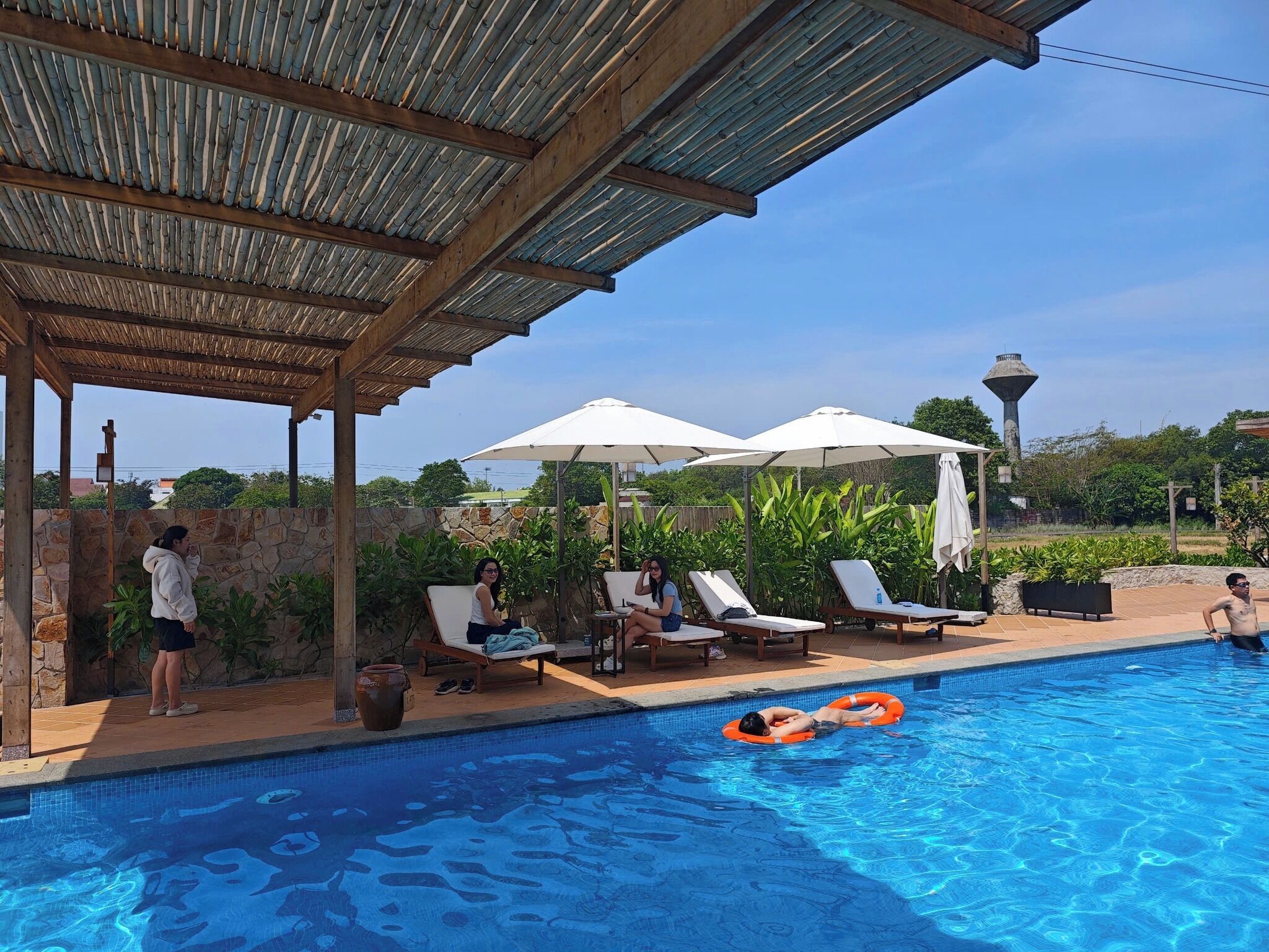 15 outdoor pools, pool umbrellas, pool loungers