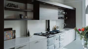 Townhome, Balcony | Private kitchen | Espresso maker, toaster, freezer, kitchen islands