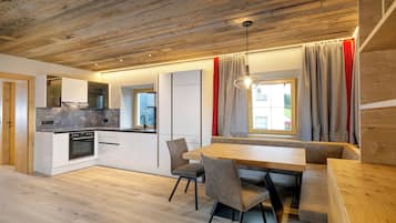Comfort Apartment, City View | Living area | Flat-screen TV, tablet