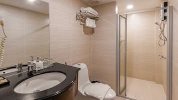 Shower, free toiletries, hair dryer, slippers