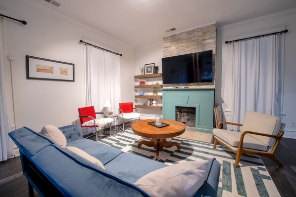 Smart TV, fireplace, video games, foosball