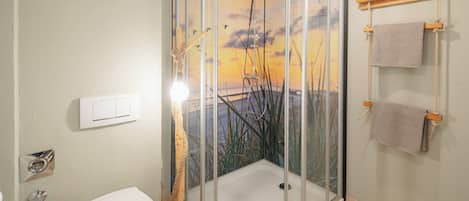 Shower, hair dryer, towels