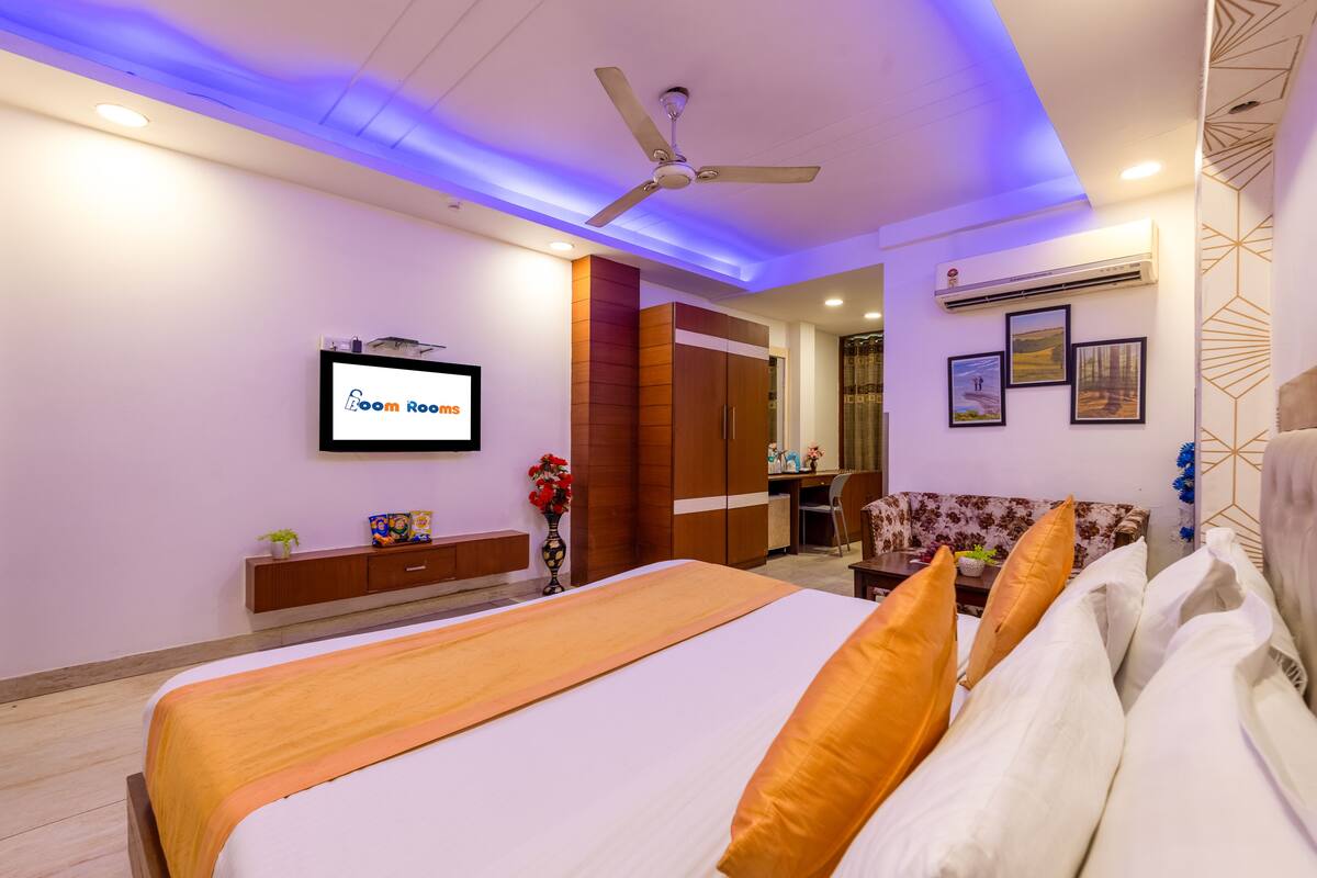 Suite Confort, vistas a la ciudad | 1 dormitorio, tabla de planchar con plancha, wifi gratis